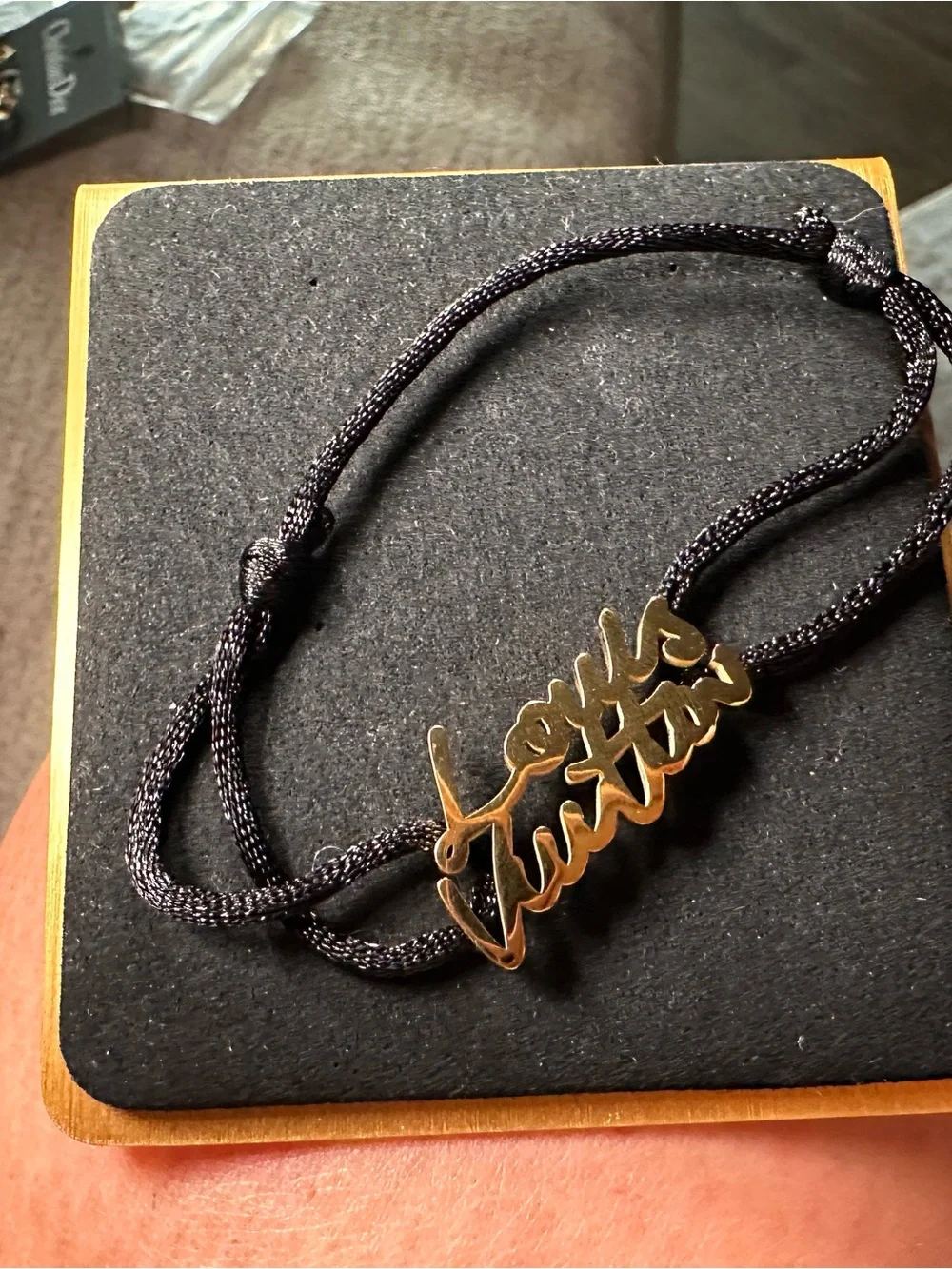 Lv Gold Script Logo Cord Bracelet on Black Cord